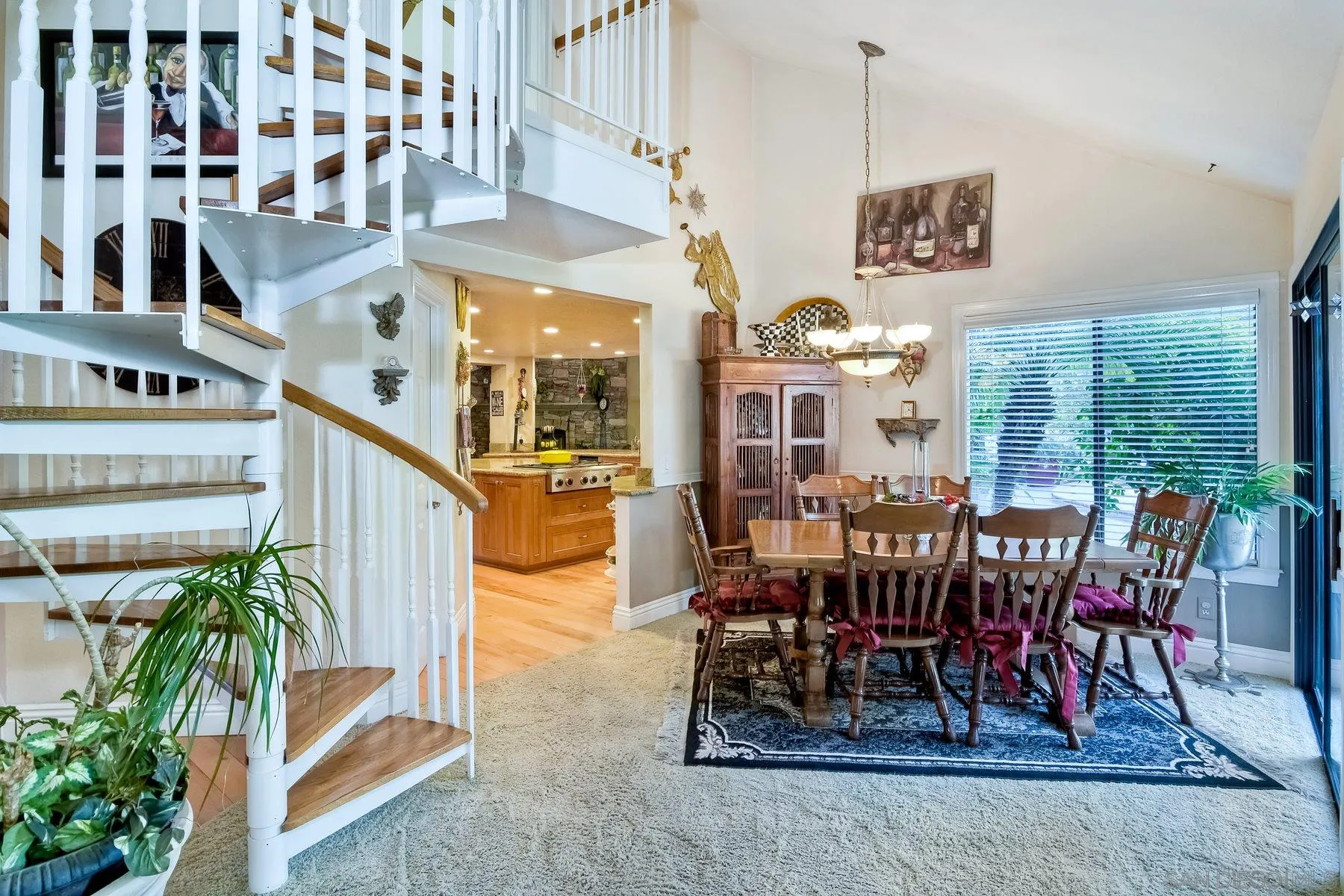 14248 Ipava Drive Poway, CA 92064 - Photo 14 of 34 a dining room with furniture and a potted plant