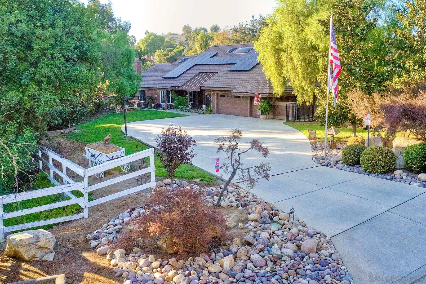 14248 Ipava Drive Poway, CA 92064 - Photo 2 of 34 a front view of a house with garden
