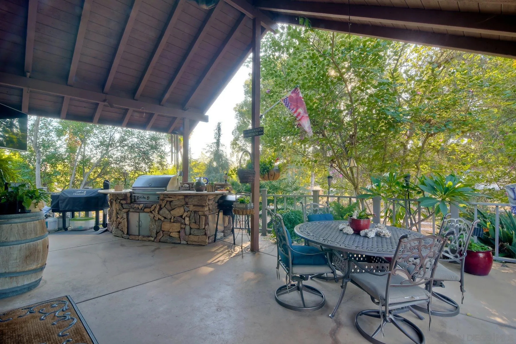 14248 Ipava Drive Poway, CA 92064 - Photo 23 of 34 a view of outdoor dining space with a table and chairs