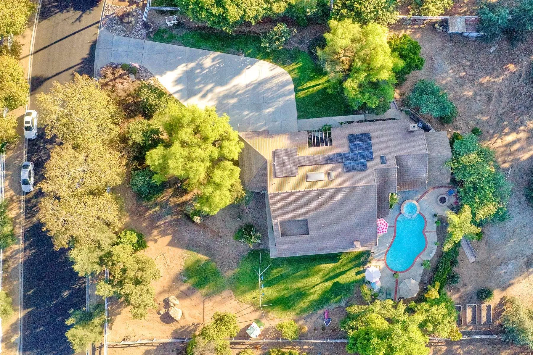14248 Ipava Drive Poway, CA 92064 - Photo 31 of 34 an aerial view of a house with a yard and garden
