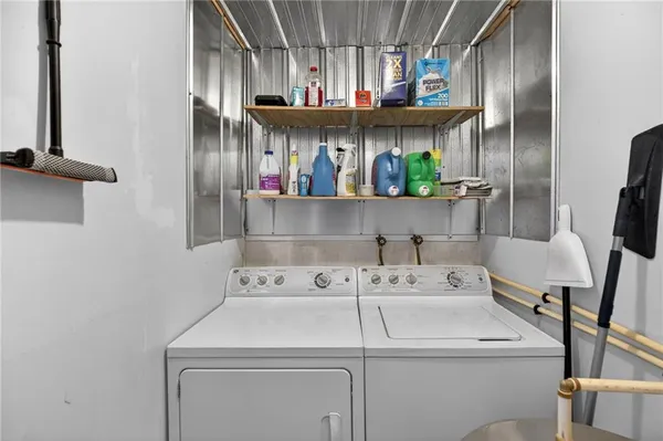 a utility room with dryer and washer