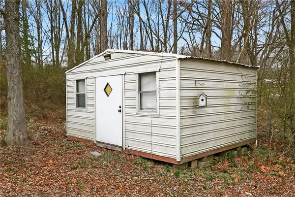 a picture of a bathroom with a shower