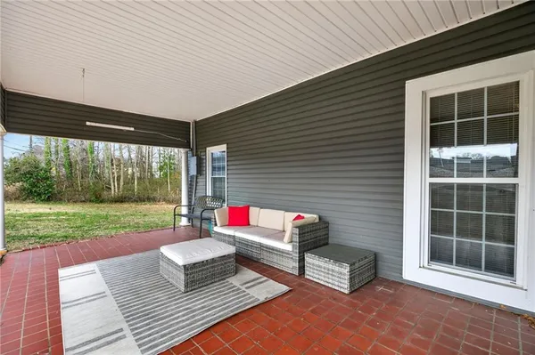a garden view with a seating space