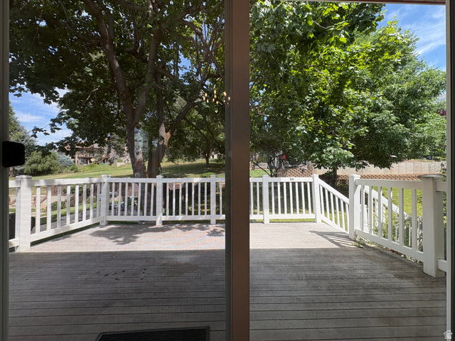 595 Meadowlark Road Orem, UT 84097 - Photo 8 of 87 Expansive outdoor deck featuring wood-finish flooring and white perimeter railing