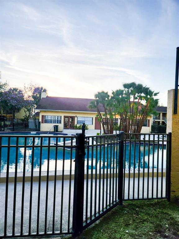 7327 Abonado Road, Unit 7327 Tampa, FL 33615 - Photo 8 of 9 a view of a large building from a roof deck
