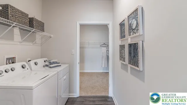 a utility room with dryer and washer