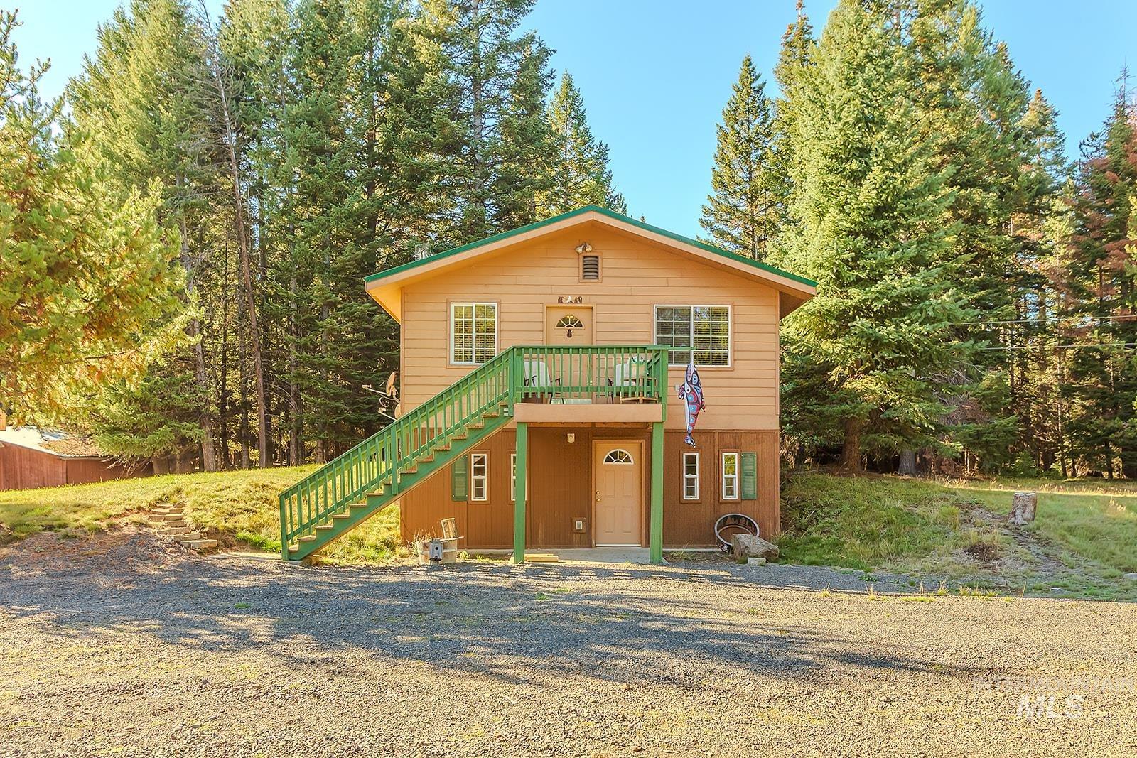 Rustic home featuring stairway