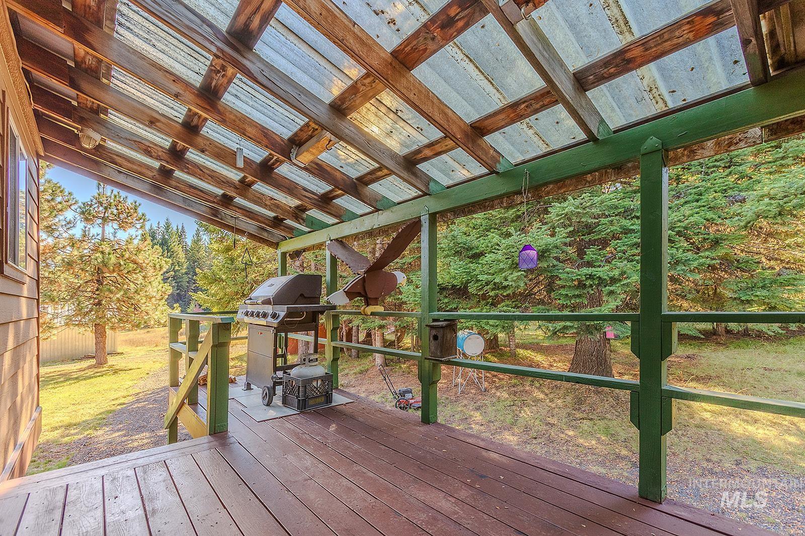 25314 Soldiers Meadow Road Winchester, ID 83555 - Photo 36 of 45 Wooden terrace with grilling area