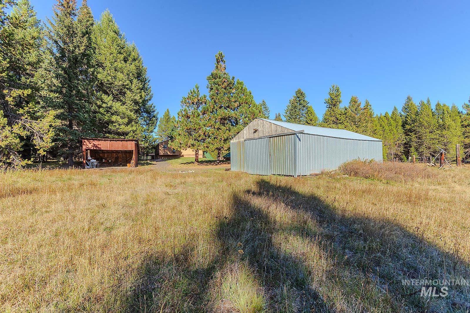 25314 Soldiers Meadow Road Winchester, ID 83555 - Photo 38 of 45 View of yard featuring an outbuilding