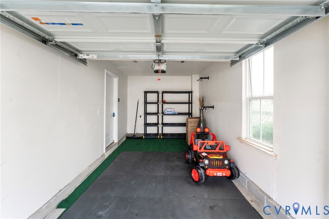7809 Chasing Lane Richmond, VA 23237 - Photo 16 of 23 an empty room with windows