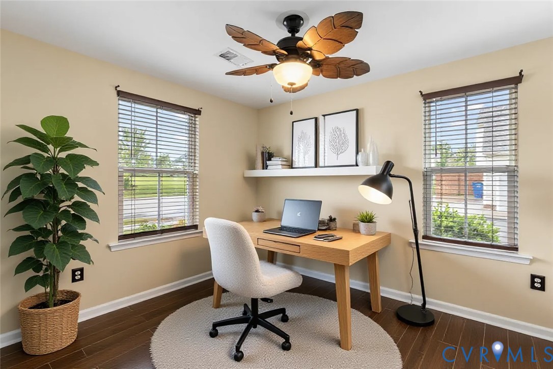 7809 Chasing Lane Richmond, VA 23237 - Photo 3 of 23 a workspace with furniture and a potted plant