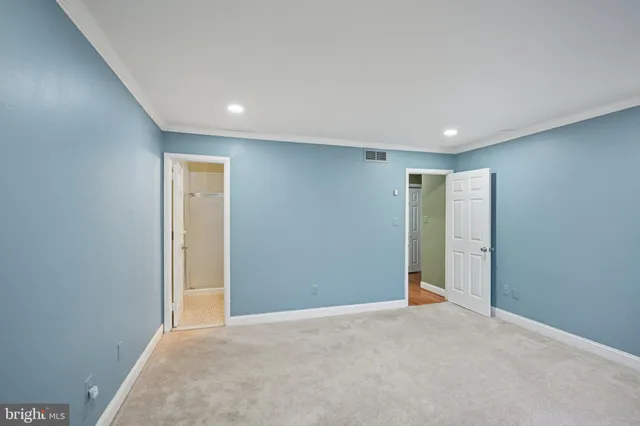 a view of a balcony with wooden floor