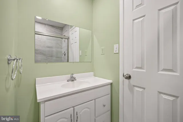 front view of a brick house with a street