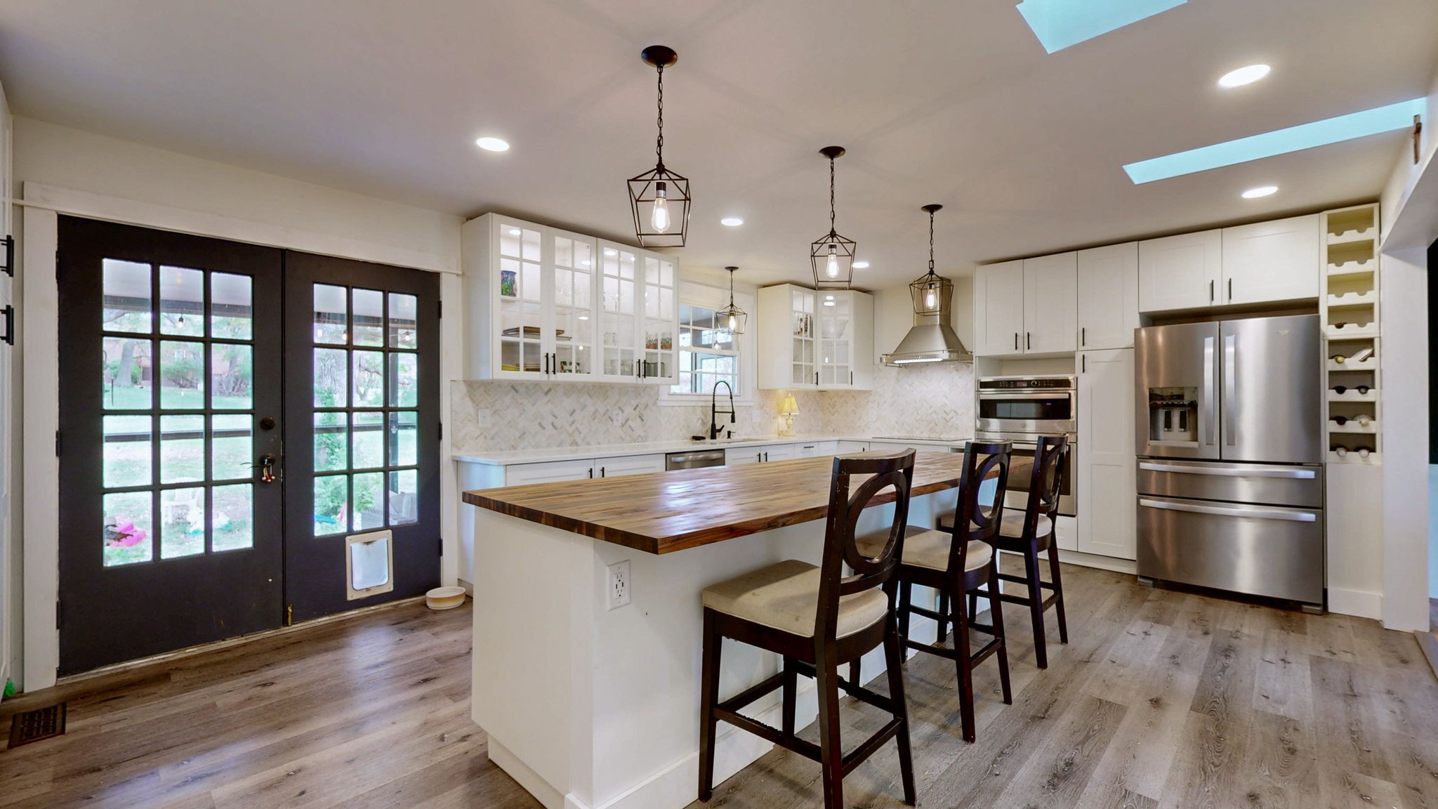 463 Walton Ferry Road Hendersonville, TN 37075 - Photo 3 of 54 a kitchen with stainless steel appliances granite countertop a kitchen island hardwood floor and a sink
