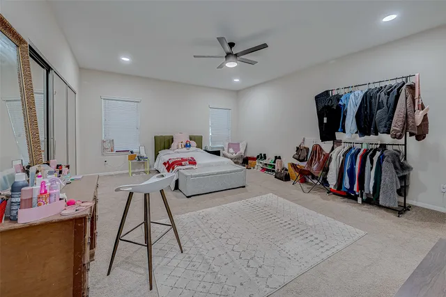 a bed room with a bed and a couch