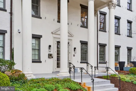 a front view of a building with glass windows
