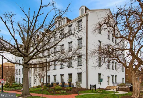 a view of building with yard