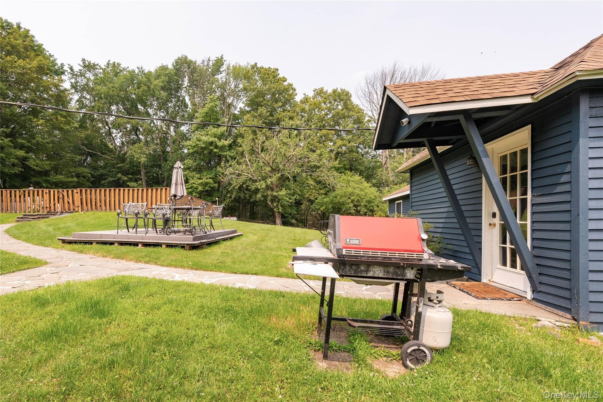 670 Creamery Road Mongaup Valley, NY 12762 - Photo 14 of 47 a view of a chairs and table in the patio