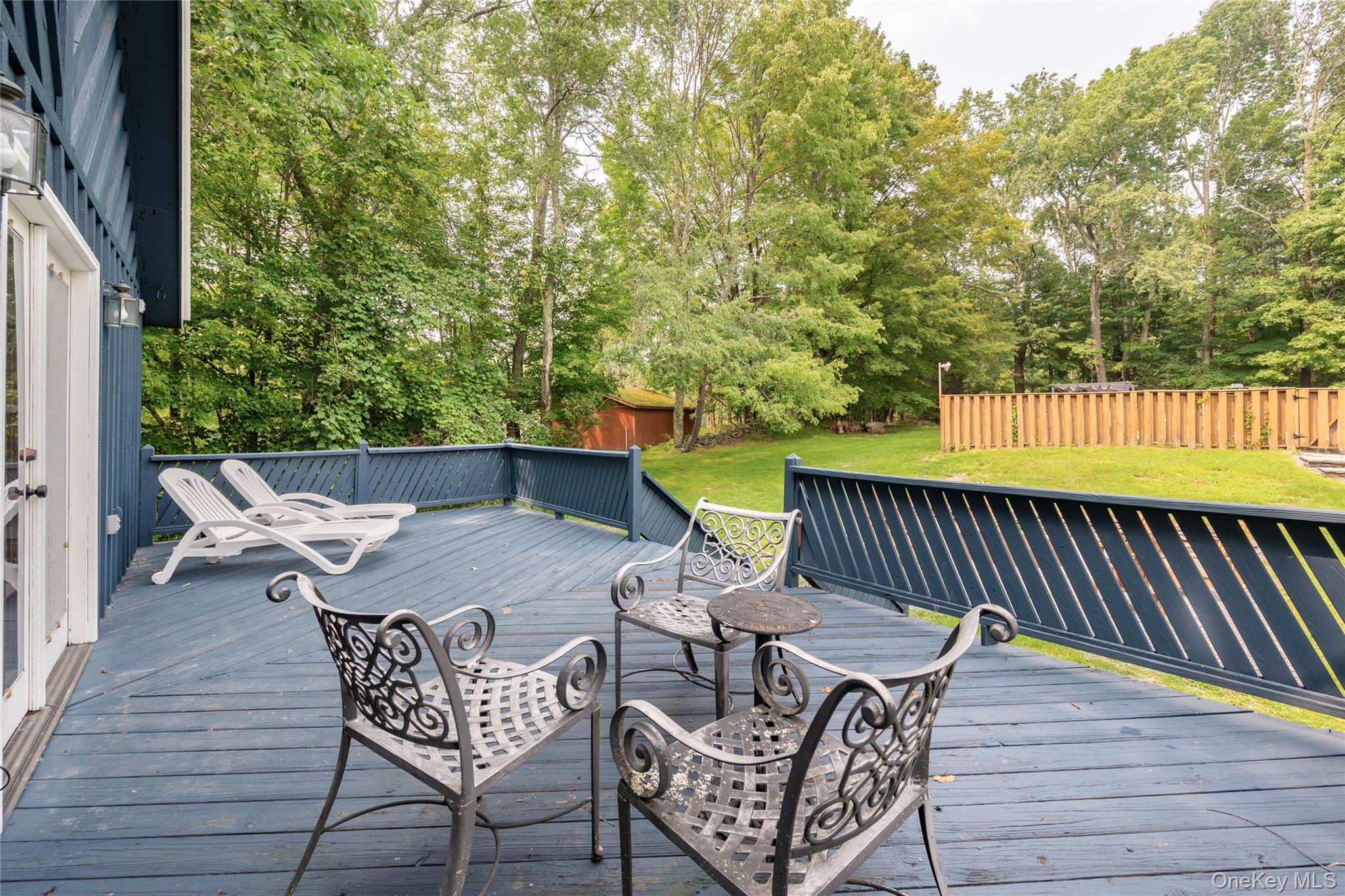 670 Creamery Road Mongaup Valley, NY 12762 - Photo 2 of 47 a view of a chairs and table on the wooden floor