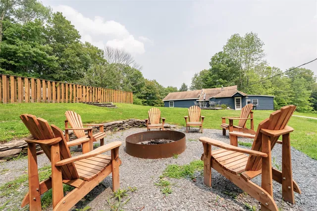 a bathroom with a sink mirror toilet and shower