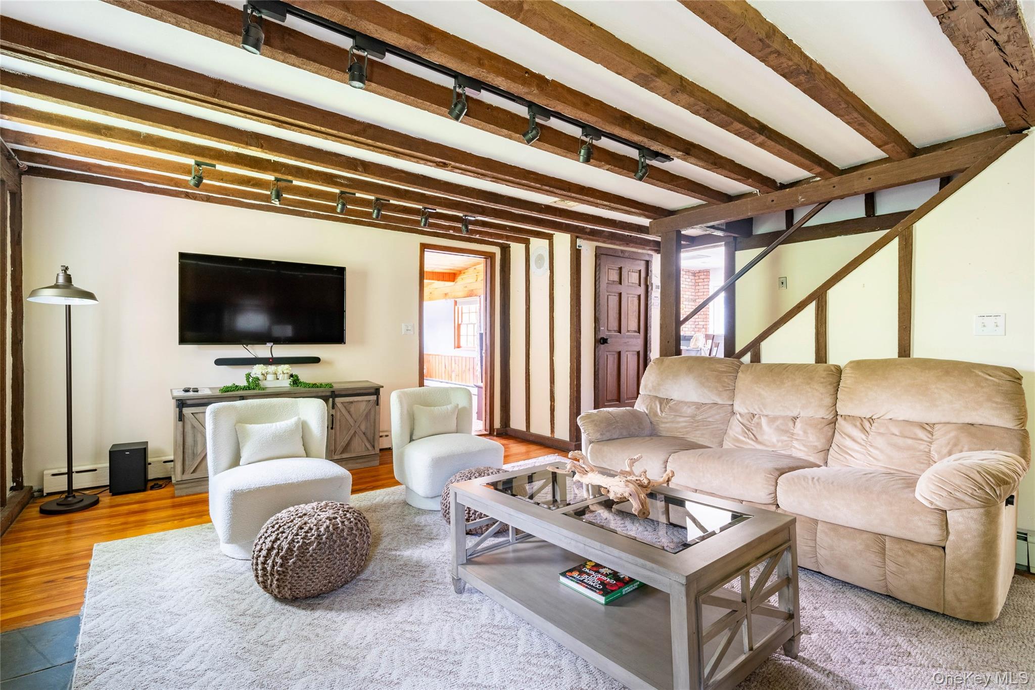 670 Creamery Road Mongaup Valley, NY 12762 - Photo 34 of 47 a living room with furniture and a flat screen tv