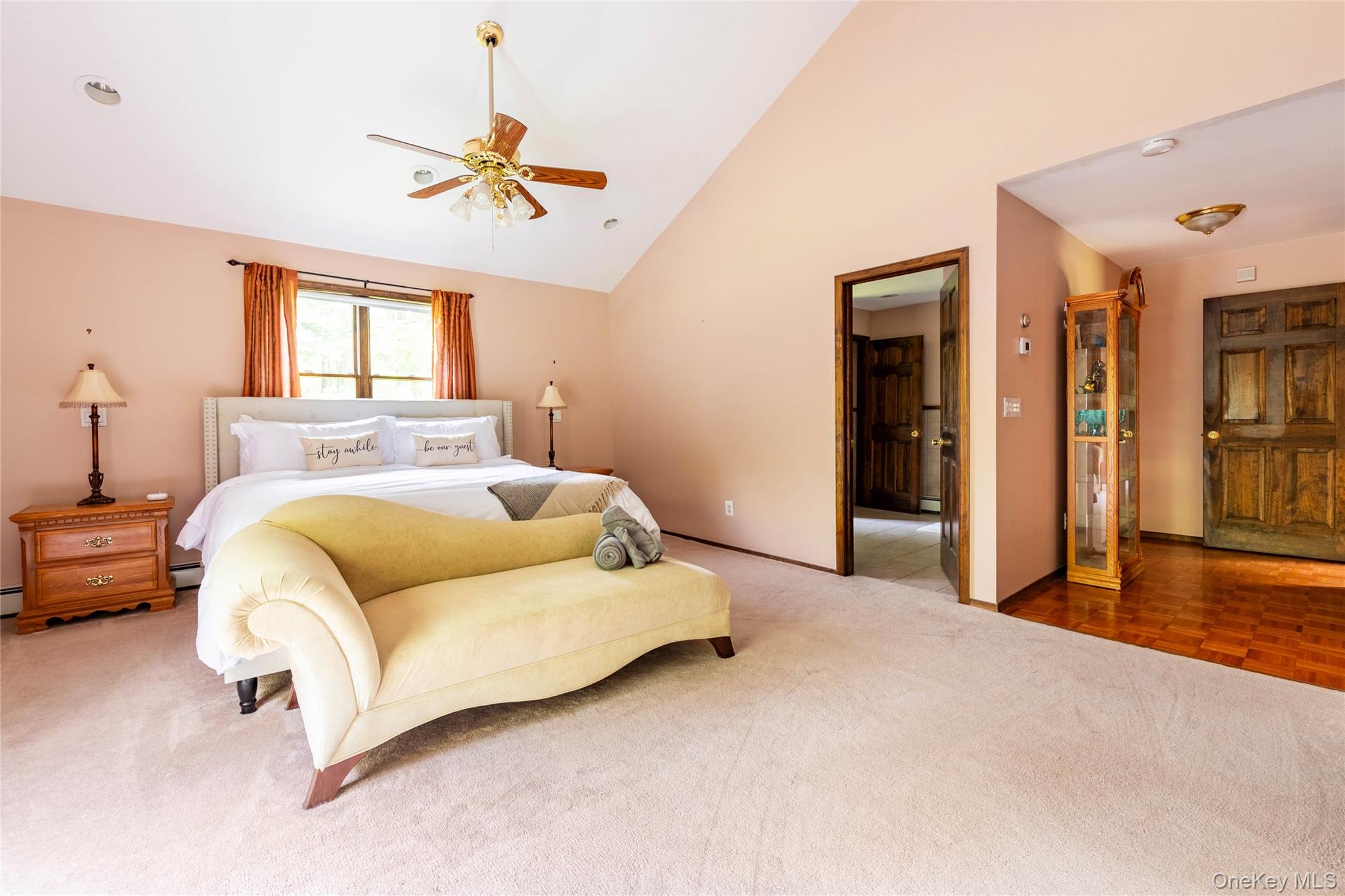 670 Creamery Road Mongaup Valley, NY 12762 - Photo 39 of 47 a spacious bedroom with a bed and a chandelier