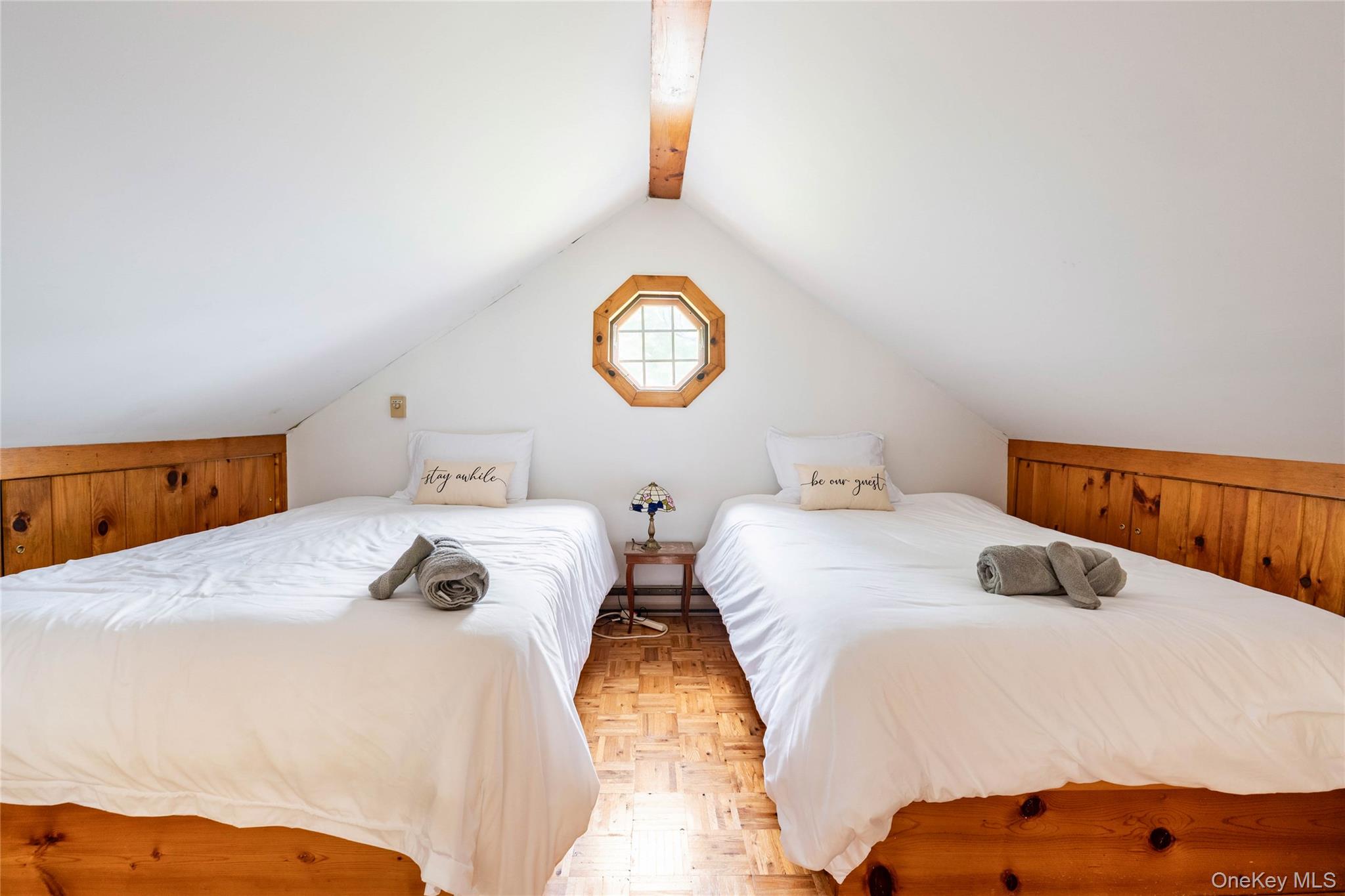 670 Creamery Road Mongaup Valley, NY 12762 - Photo 10 of 47 a bedroom with 2 bed and a lamp