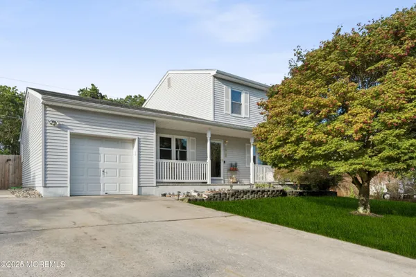 front view of house with a yard