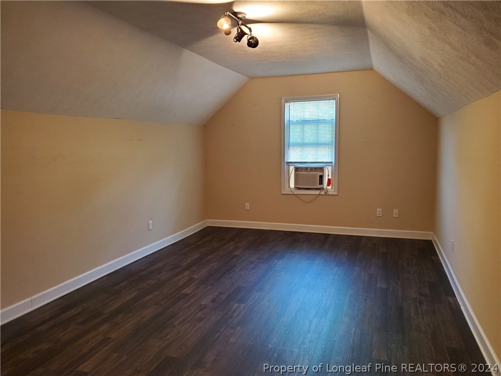 2713 Rockfish Road Raeford, NC 28376 - Photo 29 of 29 a view of a livingroom with wooden floor and window