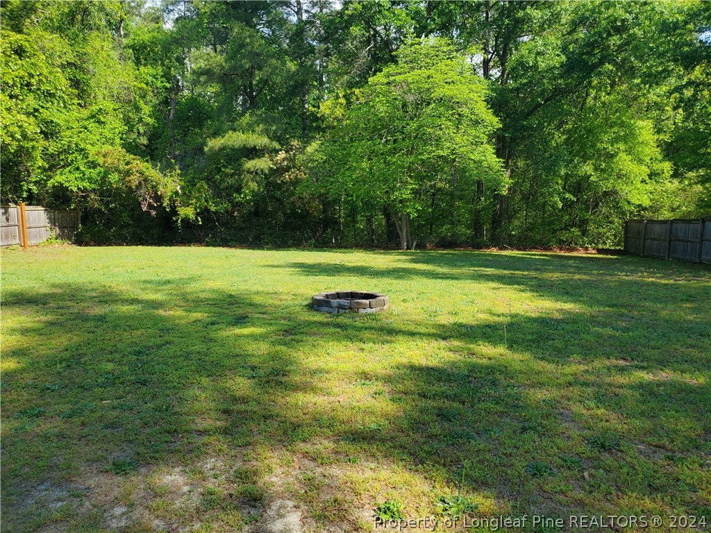 2713 Rockfish Road Raeford, NC 28376 - Photo 3 of 29 a view of a golf course with a yard