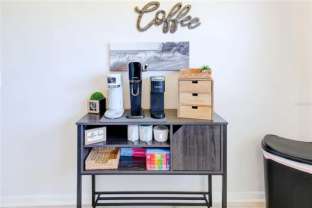a living room with furniture and flat screen tv