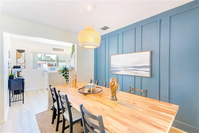 a view of a dining room with furniture