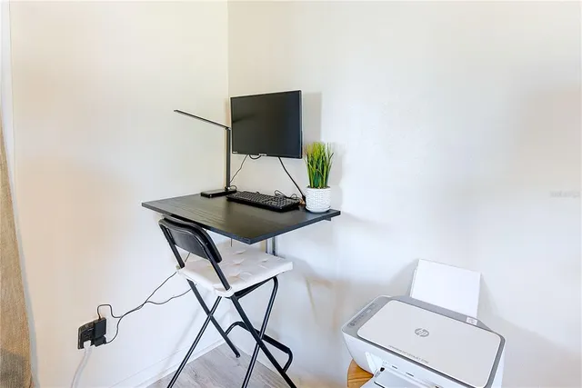 a living room with a couch and a flat screen tv