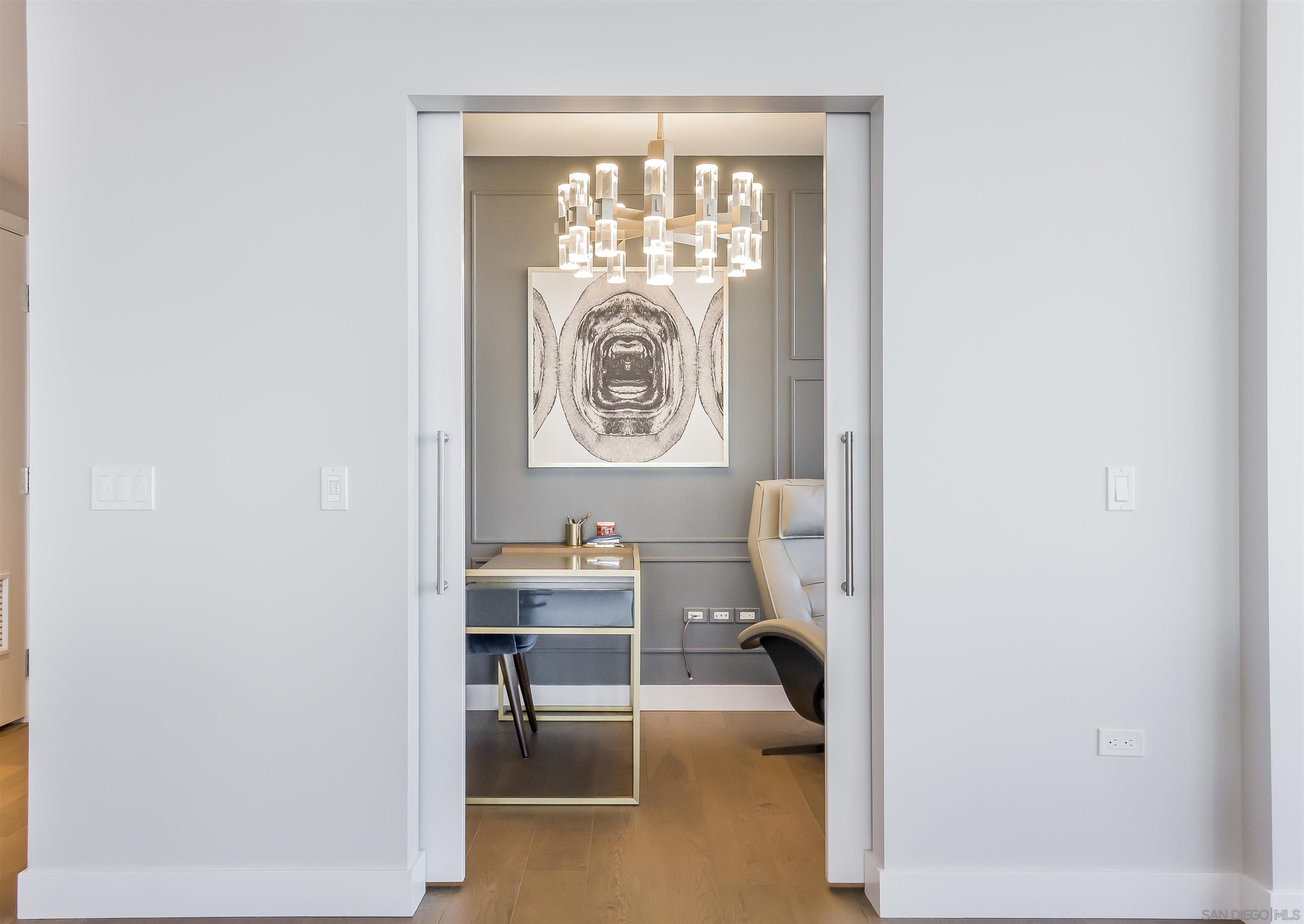 888 E Street, Unit 3602 San Diego, CA 92101 - Photo 16 of 51 a view of a room with a lounge chair the ceiling fan