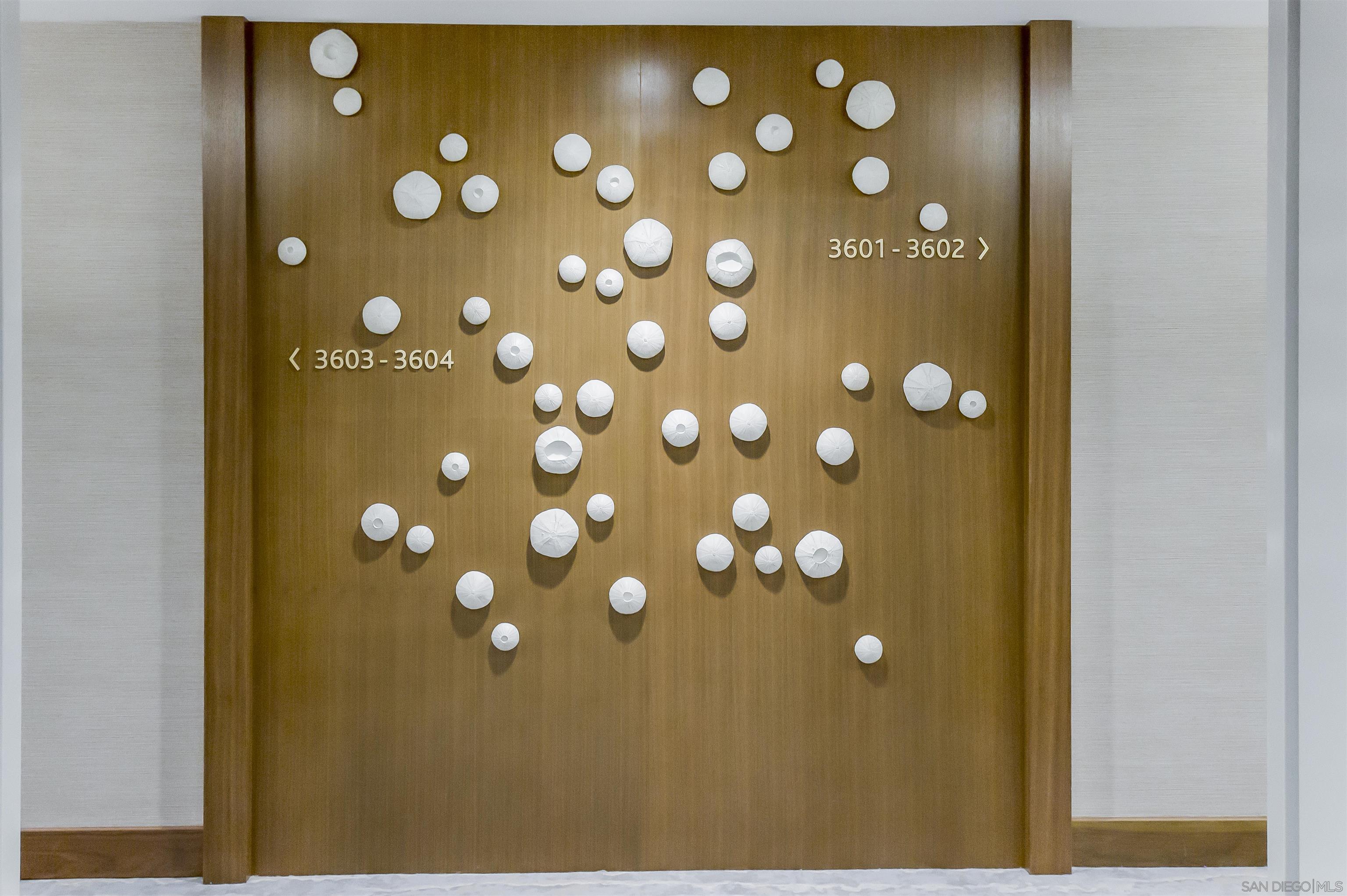 888 E Street, Unit 3602 San Diego, CA 92101 - Photo 32 of 51 a bathroom with a granite countertop sink and a mirror