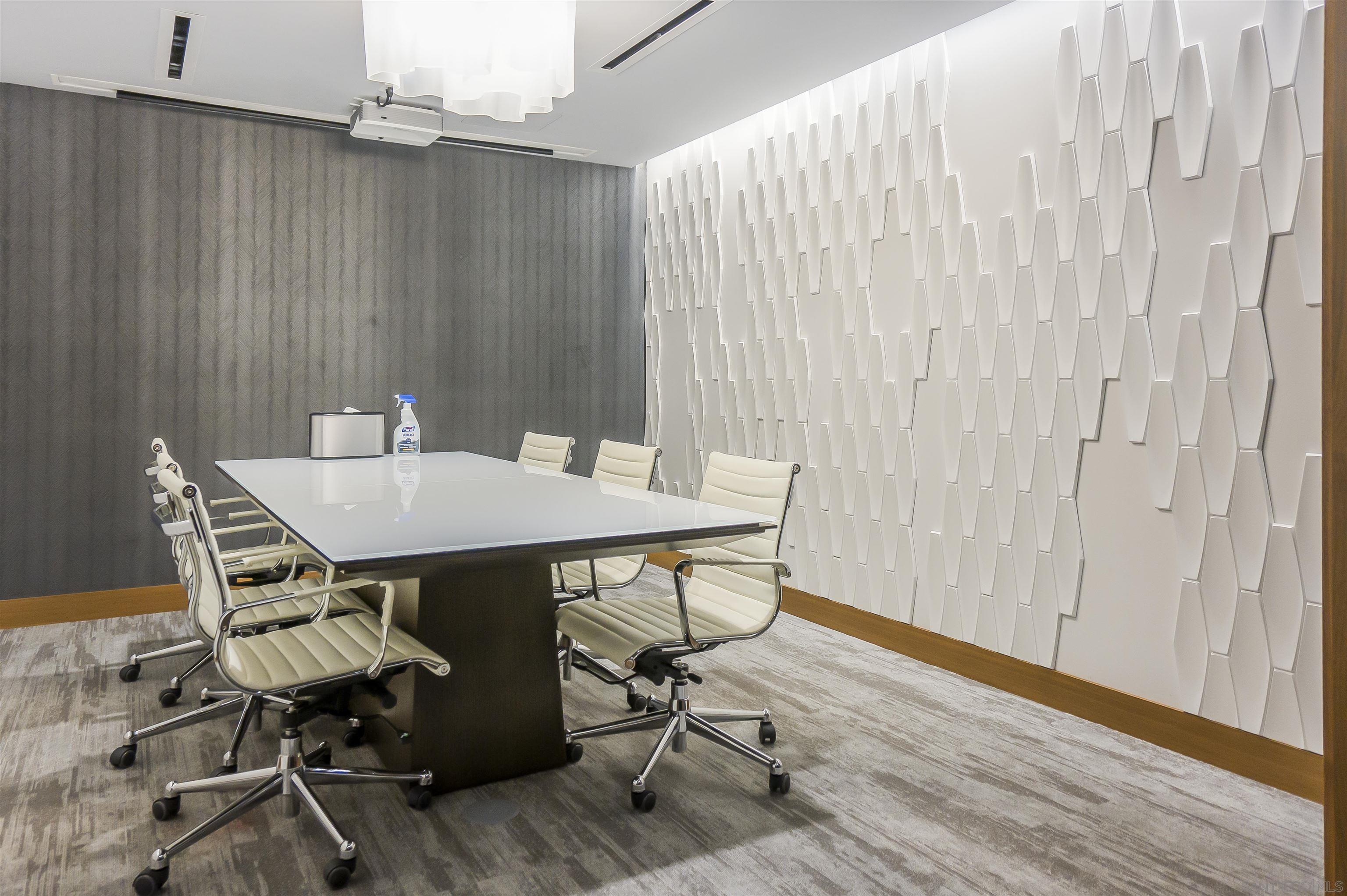 888 E Street, Unit 3602 San Diego, CA 92101 - Photo 35 of 51 a view of a workspace with furniture and wooden floor