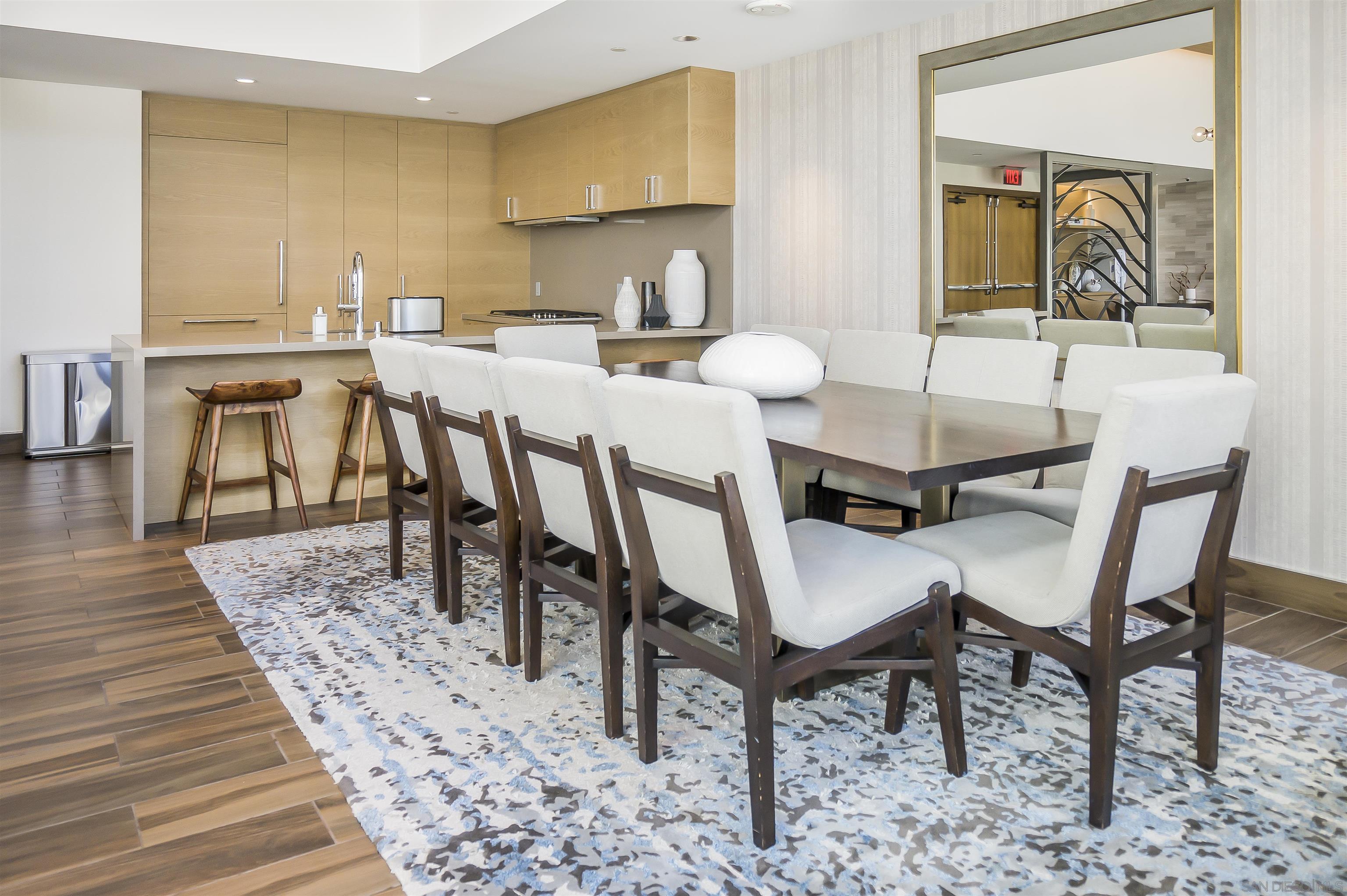 888 E Street, Unit 3602 San Diego, CA 92101 - Photo 42 of 51 a view of a dining room with furniture