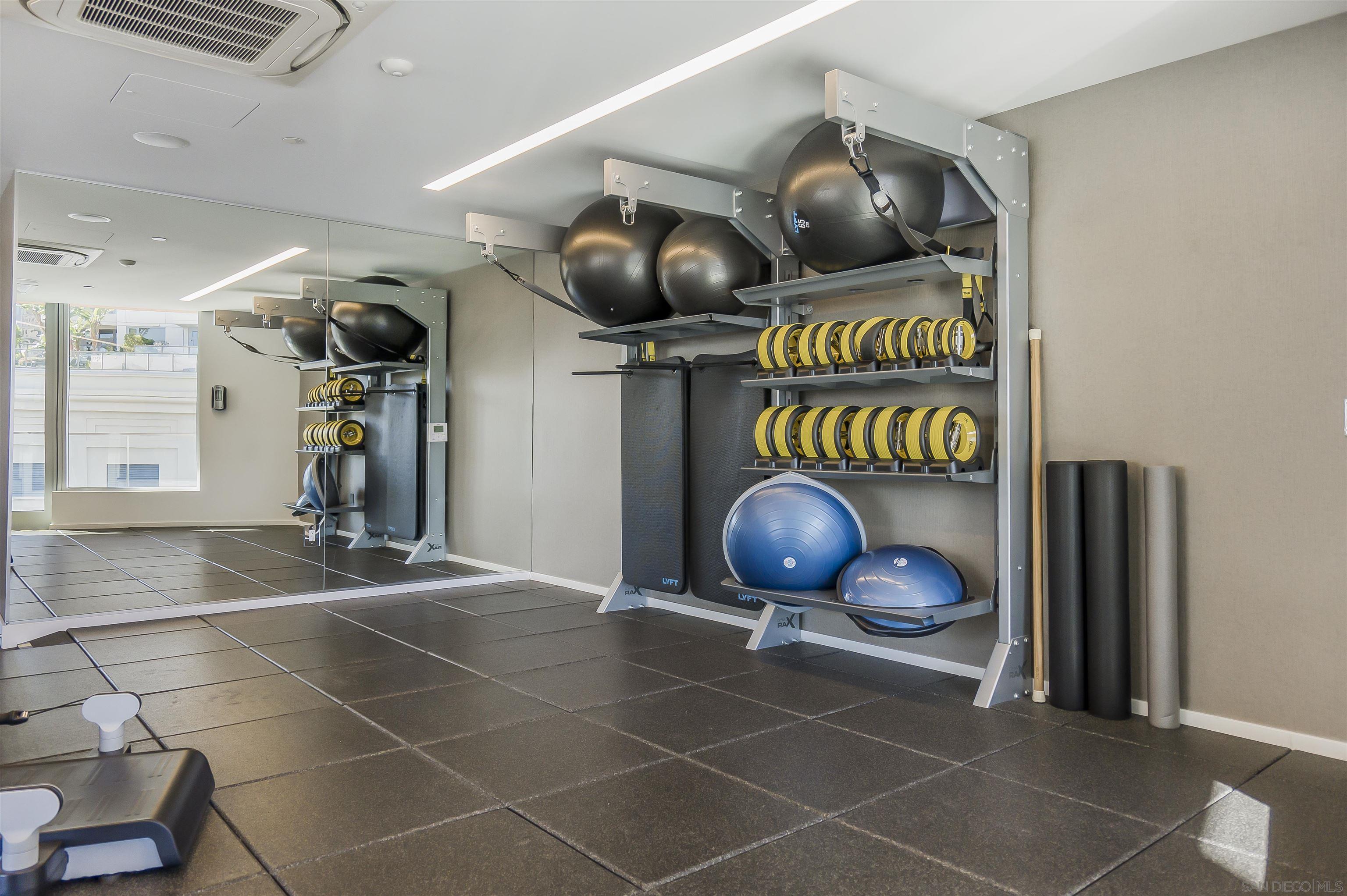 888 E Street, Unit 3602 San Diego, CA 92101 - Photo 48 of 51 a group of people sitting in a room