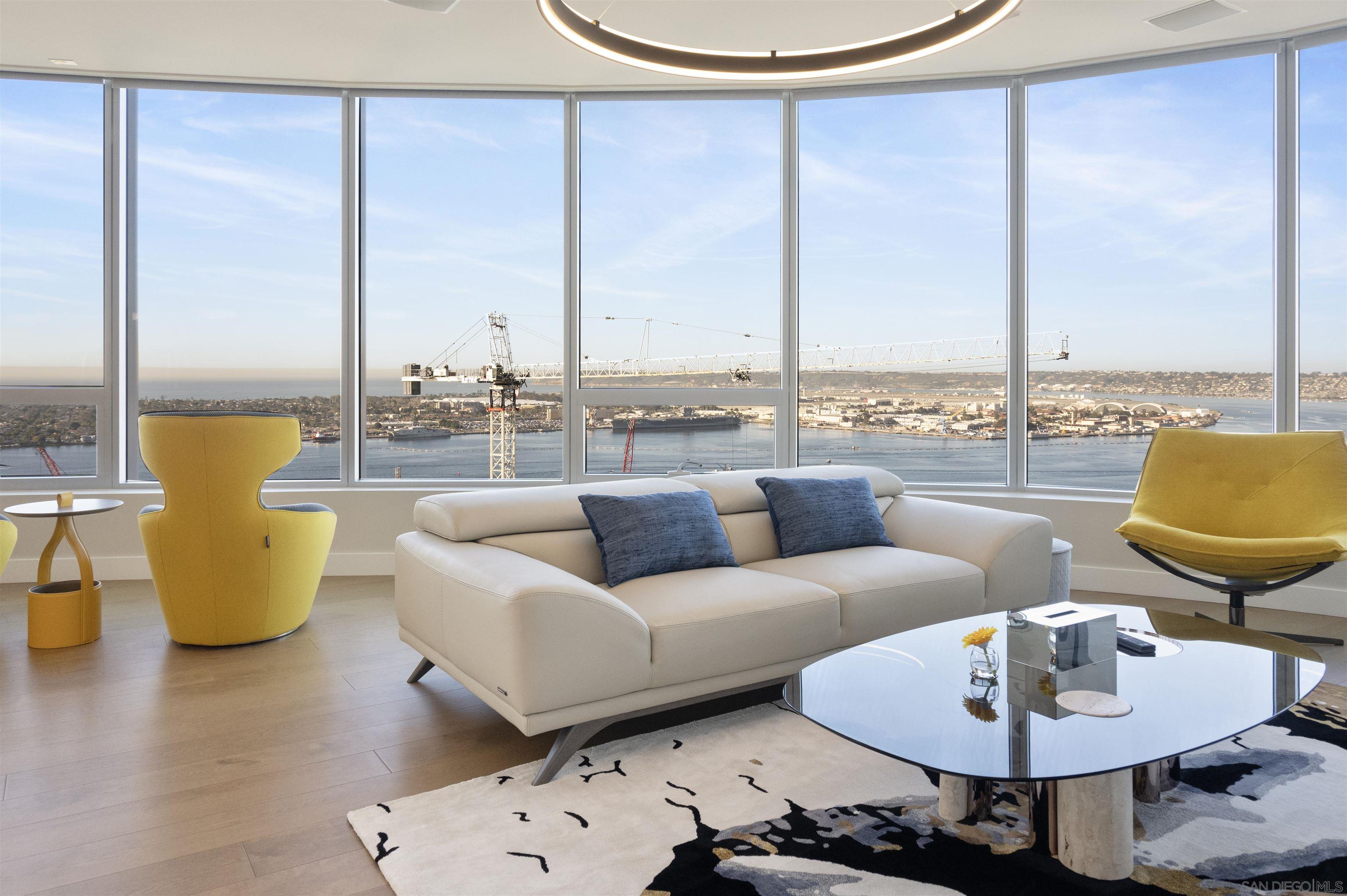 888 E Street, Unit 3602 San Diego, CA 92101 - Photo 10 of 51 a living room with furniture and a large window