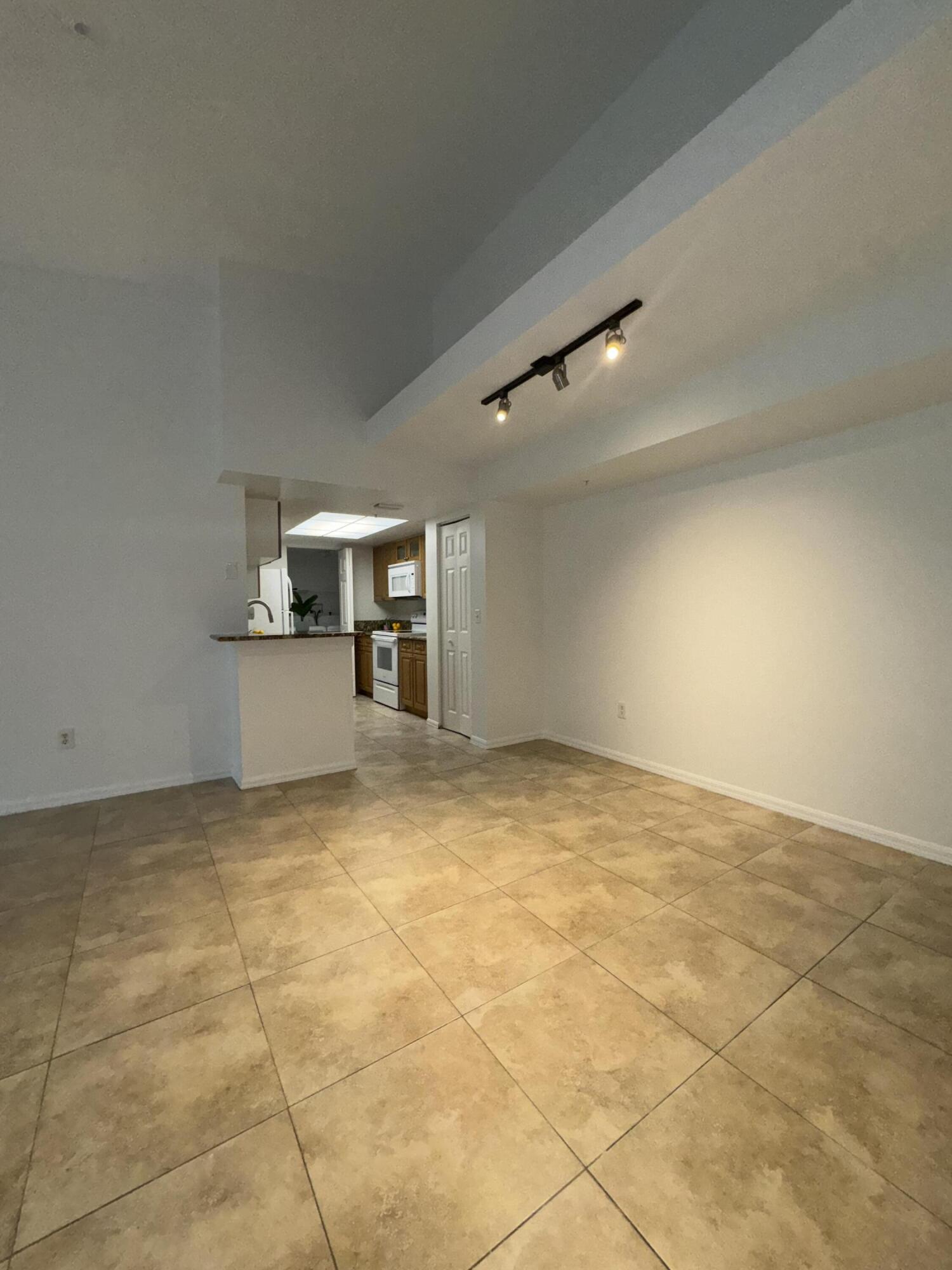 1300 Crestwood Court South, Unit 1319 Royal Palm Beach, FL 33411 - Photo 7 of 14 a view of a storage & utility room