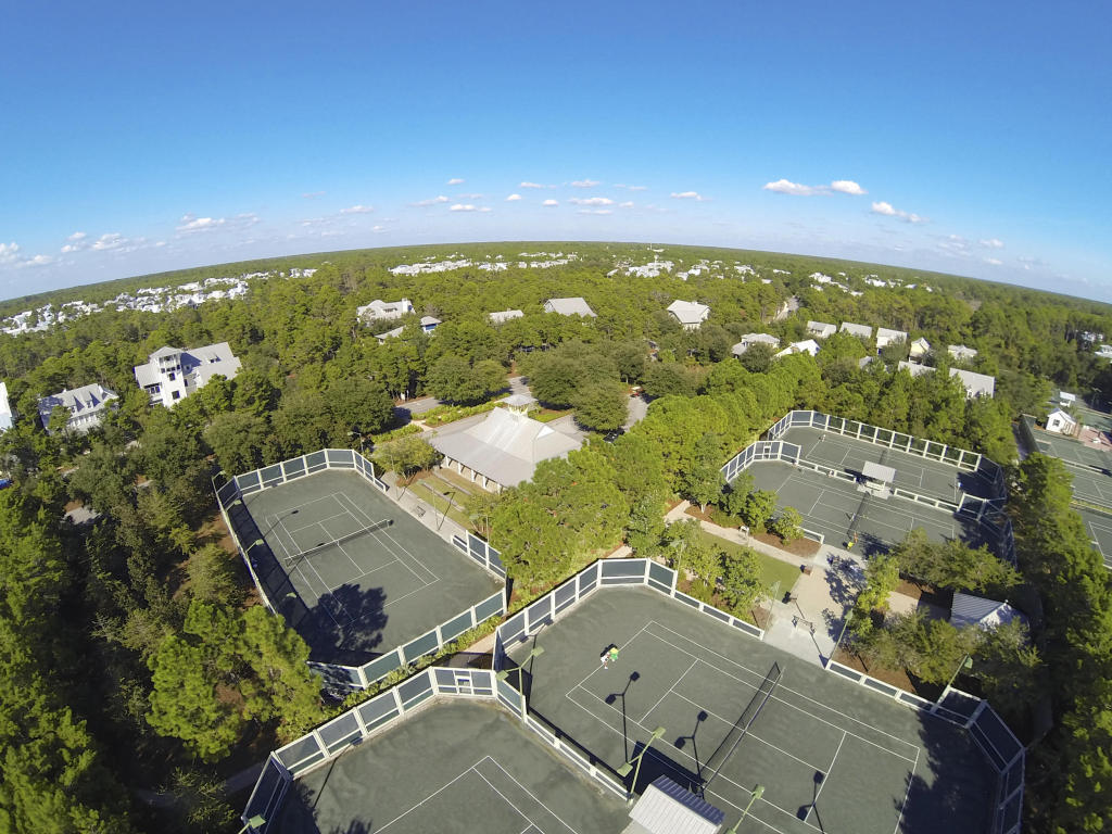 24 Pine Needle Way Santa Rosa Beach, FL 32459 - Photo 9 of 9 an aerial view of residential houses with outdoor space and swimming pool