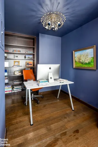 a view of a livingroom with furniture