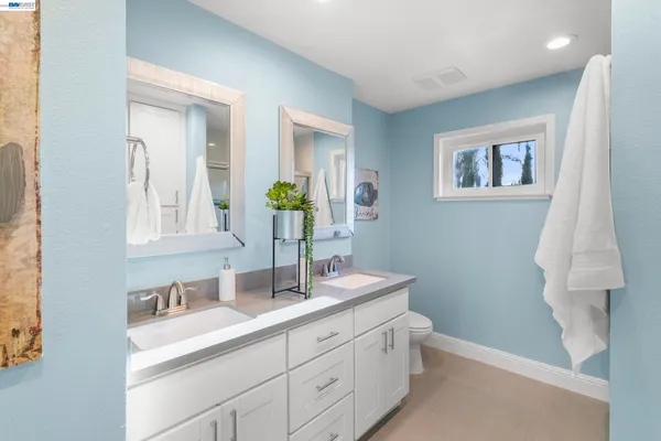 a bathroom with a shower and a toilet