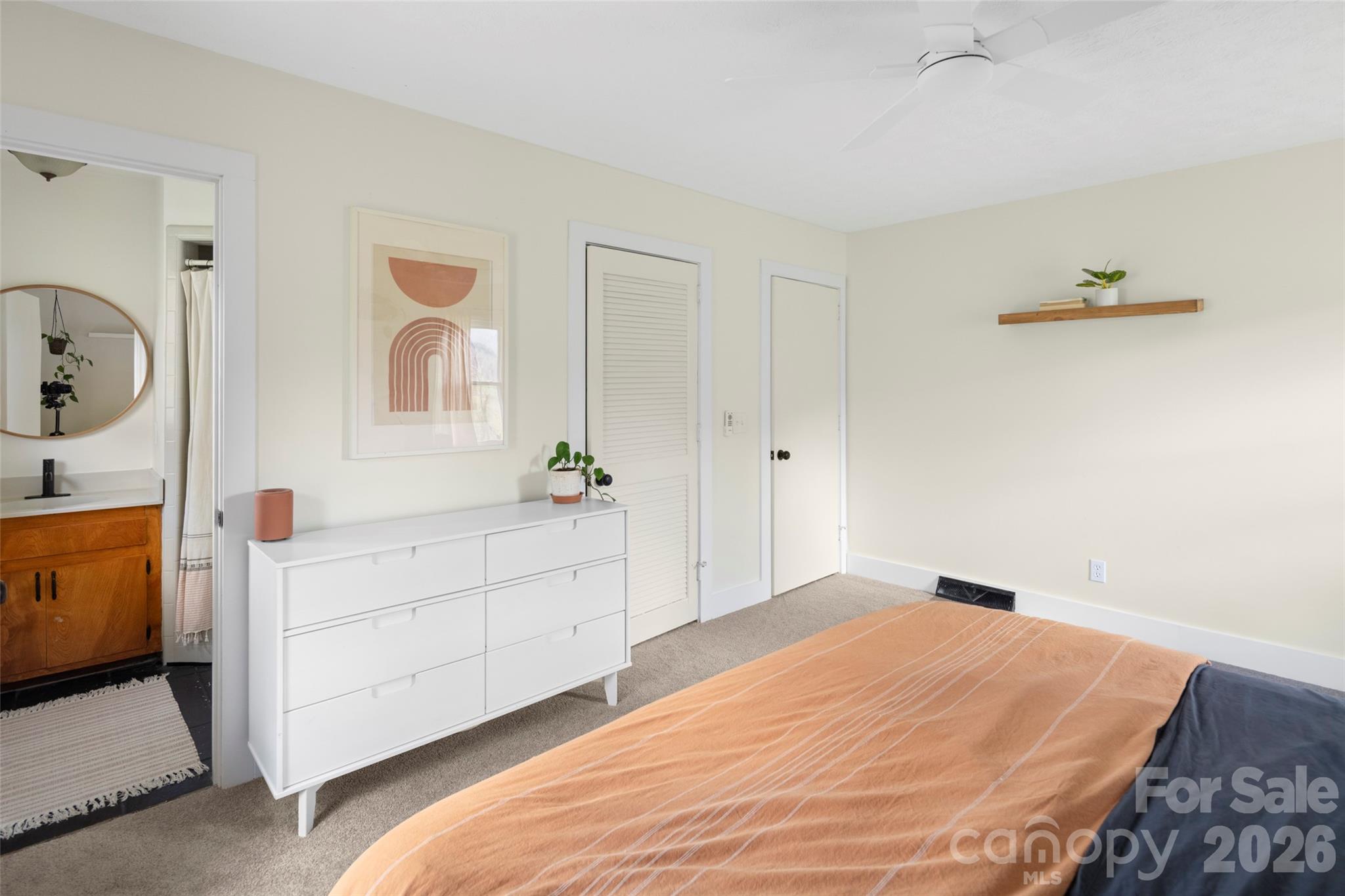 17 Boyd Cove Road Leicester, NC 28748 - Photo 19 of 40 a bedroom with a bed and a dresser