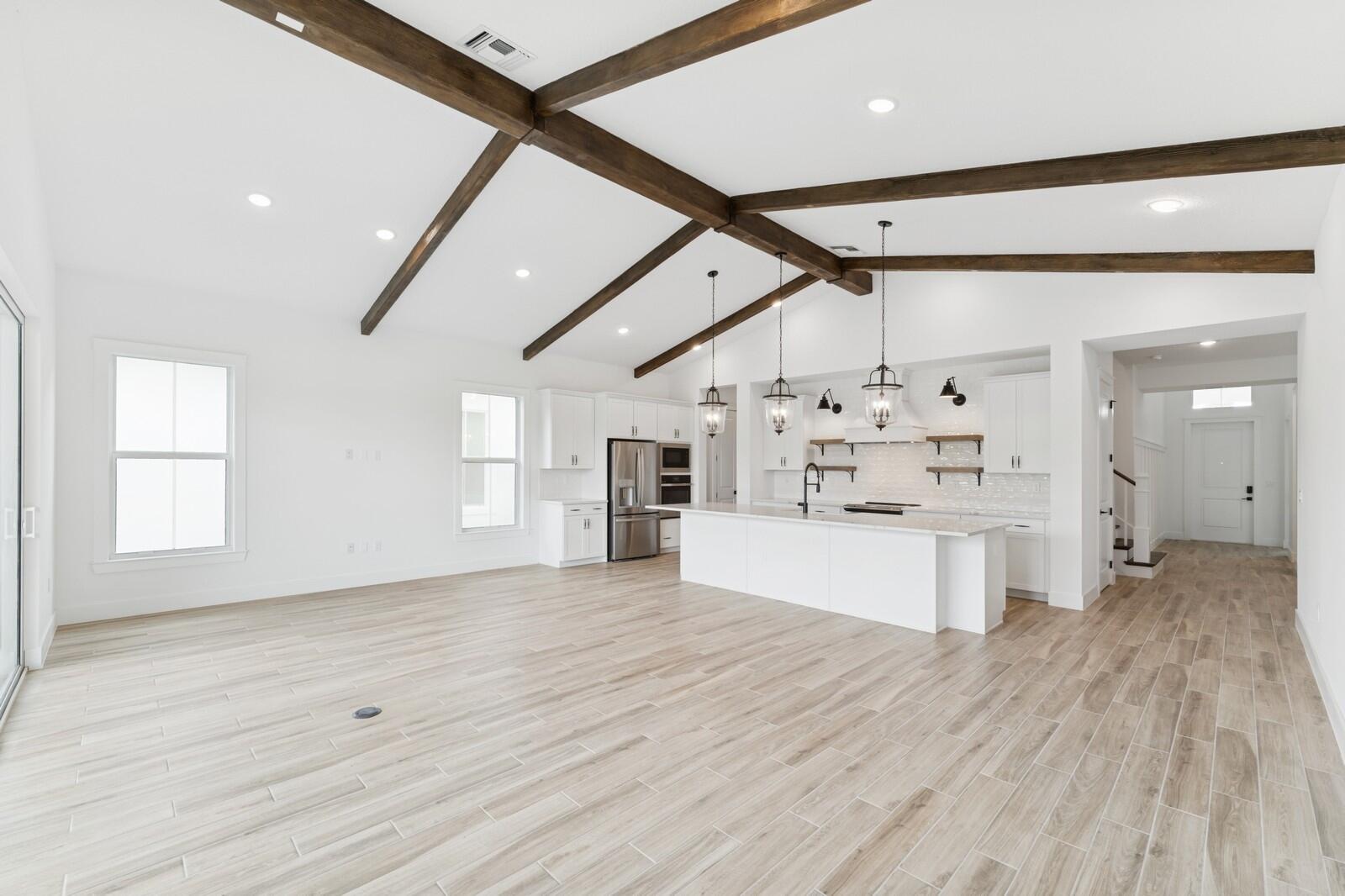 6750 Southeast Pine Drive, Unit 19 Stuart, FL 34997 - Photo 22 of 55 Stained Beams on Vaulted Ceiling
