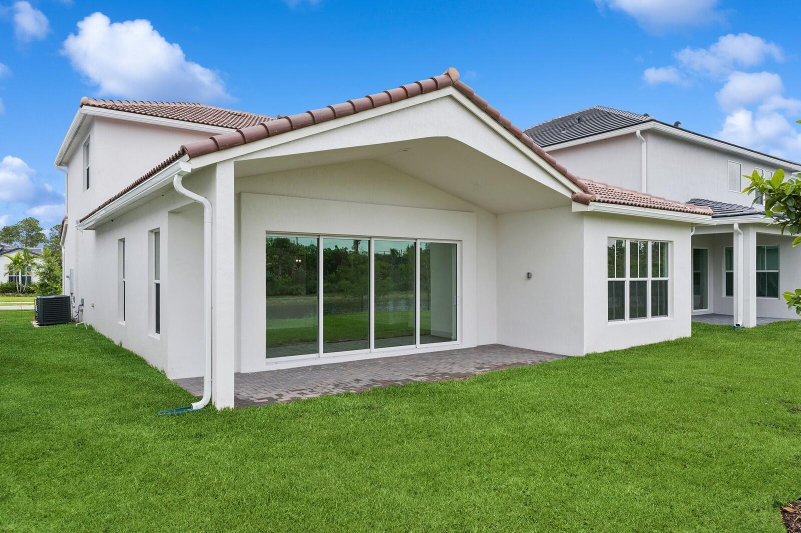 6750 Southeast Pine Drive, Unit 19 Stuart, FL 34997 - Photo 52 of 55 Backyard and Covered Patio