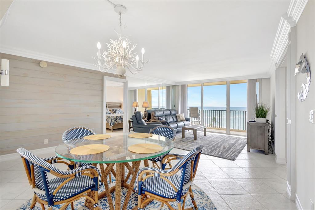 300 Ocean Trail Way, Unit 907 Jupiter, FL 33477 - Photo 13 of 42 a view of a dining room with furniture window and outside view