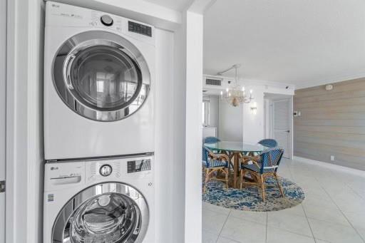 300 Ocean Trail Way, Unit 907 Jupiter, FL 33477 - Photo 32 of 42 a view of livingroom with washer and dryer