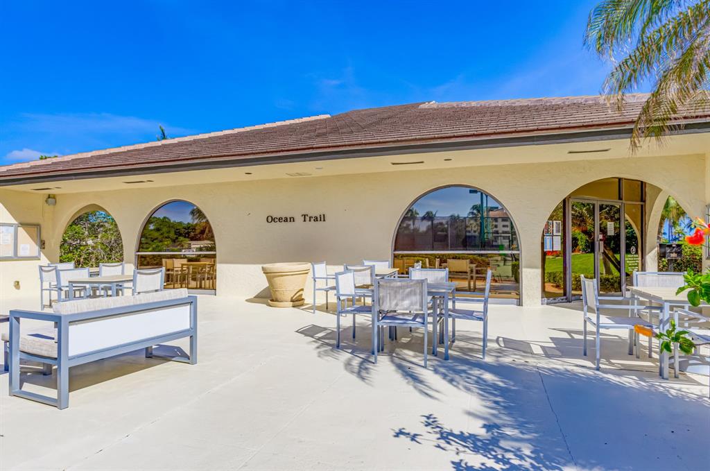 300 Ocean Trail Way, Unit 907 Jupiter, FL 33477 - Photo 38 of 42 a view of swimming pool with outdoor seating