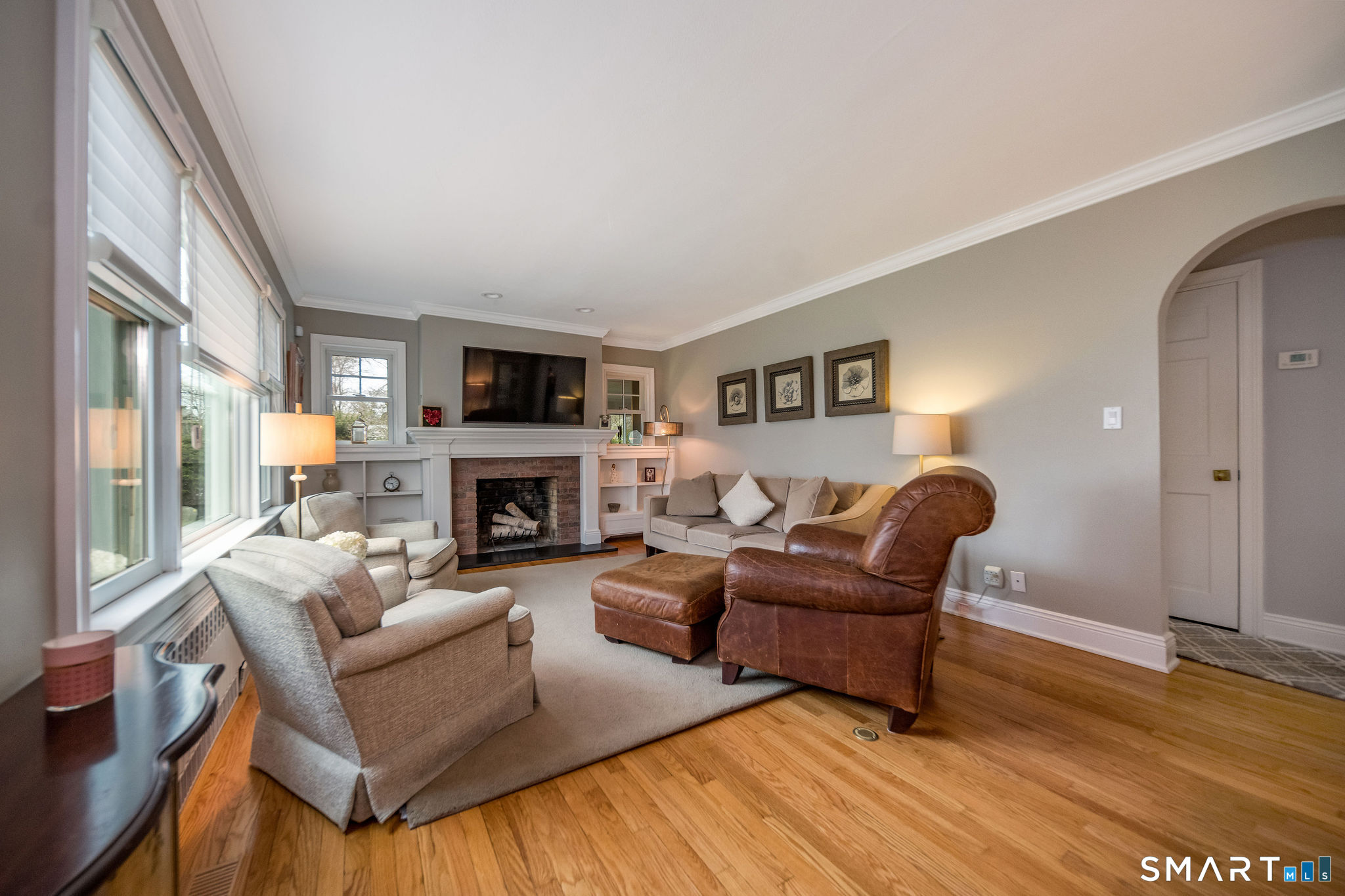 59 Forest Hill Road North Haven, CT 06473 - Photo 17 of 35 a living room with furniture and a fireplace
